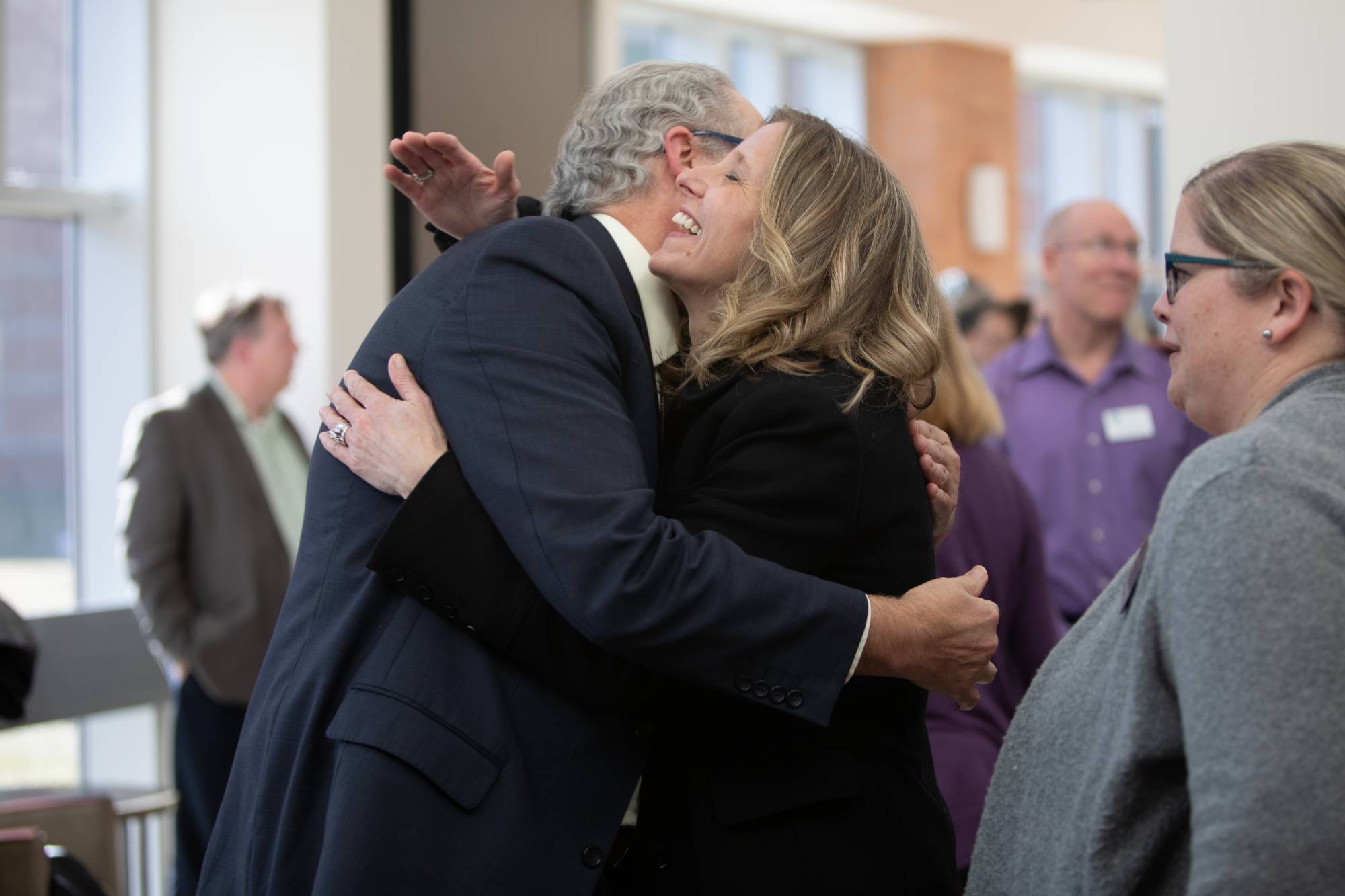 Jodi Chycinski greeting Dr. J at the ceremony